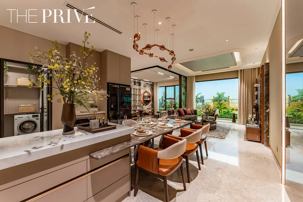 Kitchen and dining, three-bedroom residence at The Privé